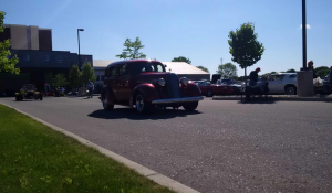 Cars prepare for the Retrofest parade.