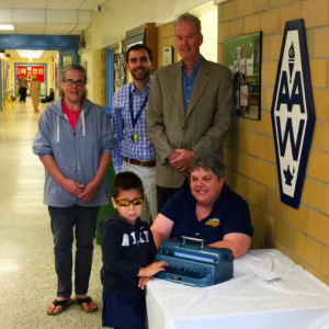 AA Wright Parent Council presented a blind student with a brailler. Photo courtesy of twitter.com