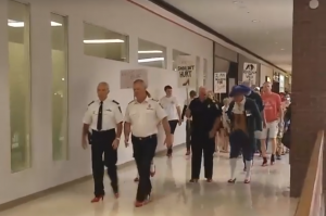 Walkers take part in the 2016 'Walk a Mile in Her Shoes' event. 