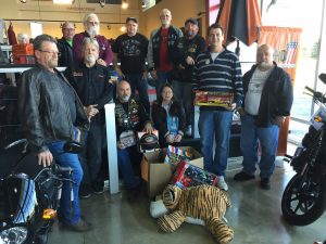 Front row club members, Bill Hudson, Chris Hall, Dave Brooks. Barb McFadden, Tim Haskell (Chatham Goodfellows), Joe Whittal. Back row, Gordon Saya, Chris Copland, Ray Harper, Jim Polyak, and Jeff McFadden. The club made the donation on November 12, to Chatham Goodfellows Director, Tim Haskell at Duke’s Harley-Davidson.