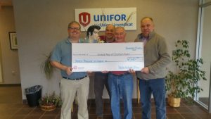 From left to right: Tom Slager, United Way of Chatham-Kent; Elvis; and representing UNIFOR, Mike Byrne, Bill Zilio and Aaron Neaves