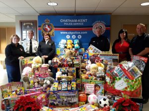 L-R: Beth Reeve, Salvation Army; CKPS Chief Gary Conn; Captain Stephanie Watkinson, Salvation Army, CKPS Inspector Brian Biskey; Co-Chair Chris Hefst; CKPS Staff Sgt Kirk Early