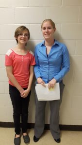 Jordan Wills (left) Grade 8 student and 4H member from Dresden with Elizabeth Buck (right), 4H Public Speaking Presentation organizer. Wills was one of 44 4H members who gave presentations at Ridgetown Campus on Tuesday evening.