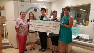 IODE presents cash to CKHA June 2017.