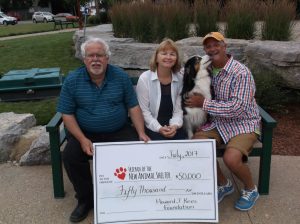 Art Stirling, -chair of the Friends of the new Animal Shelter, Foundation representative Anne Fisher, Hula and Jim Sanson of the foundation.